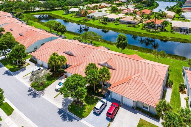 bird's eye view with a water view