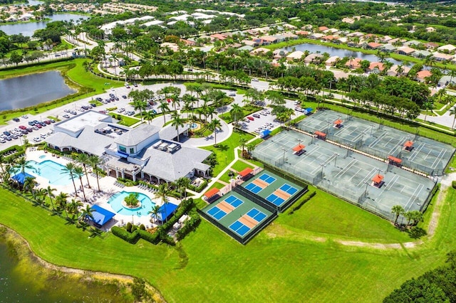 birds eye view of property featuring a water view