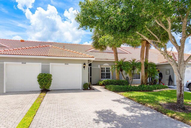 view of front of property with a garage