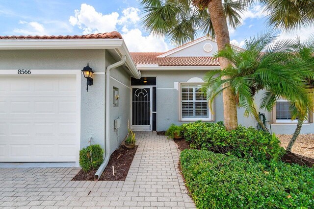 entrance to property with a garage