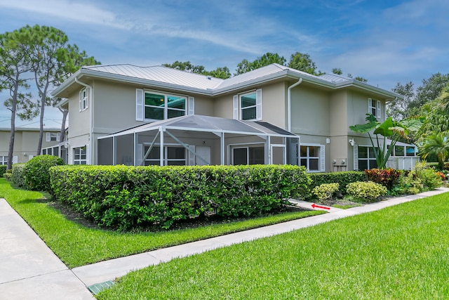 view of front of home featuring a front lawn