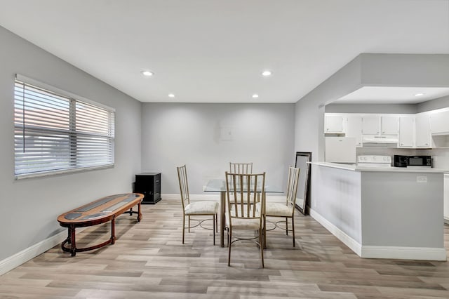 dining area featuring light hardwood / wood-style floors