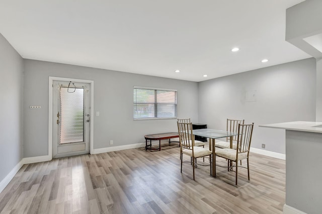 dining area with light wood-type flooring