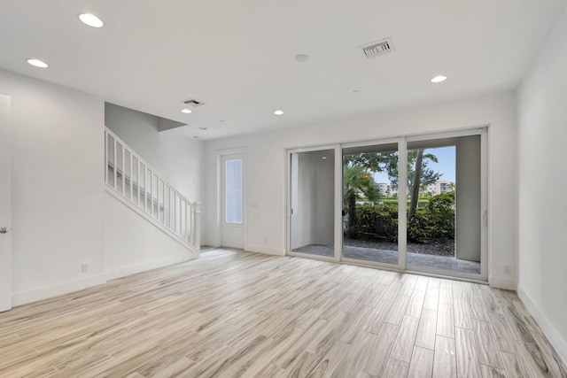 empty room featuring light hardwood / wood-style floors