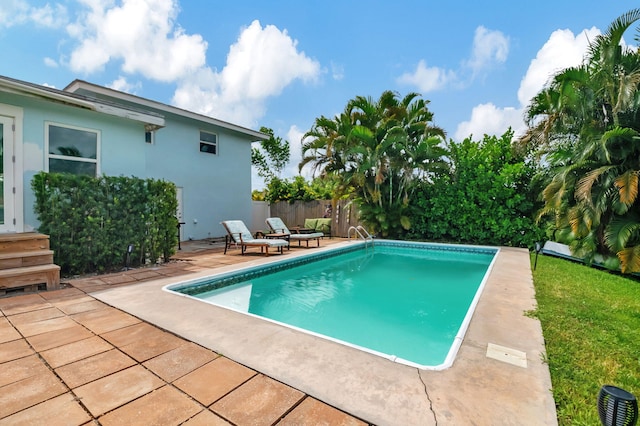 view of pool with fence, a patio area, and a fenced in pool