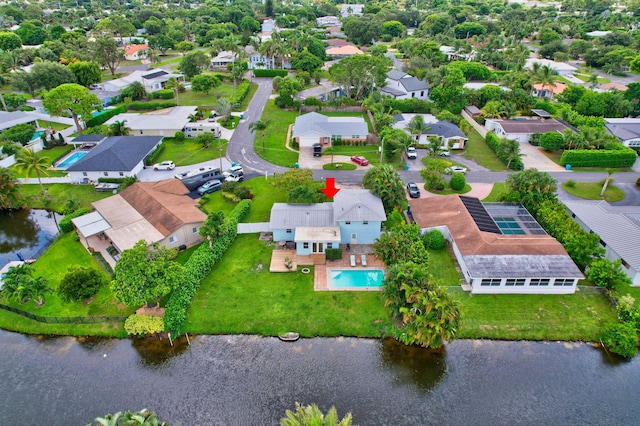 bird's eye view with a water view