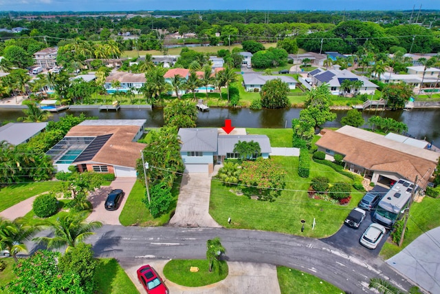 bird's eye view with a residential view and a water view