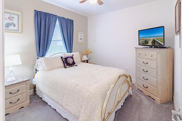 bedroom with ceiling fan and light colored carpet