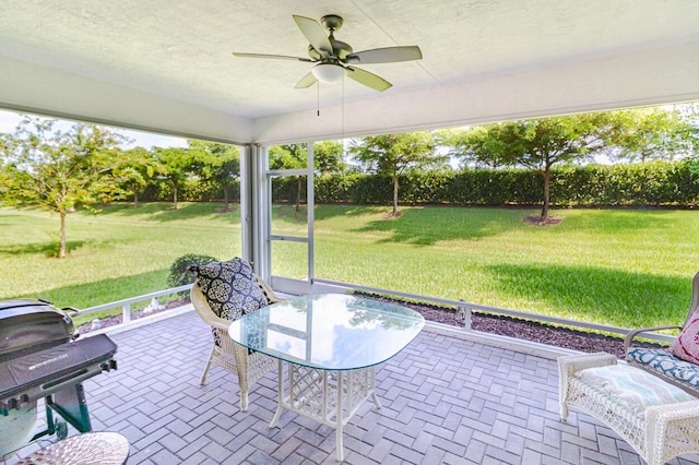 view of patio / terrace featuring a ceiling fan and area for grilling