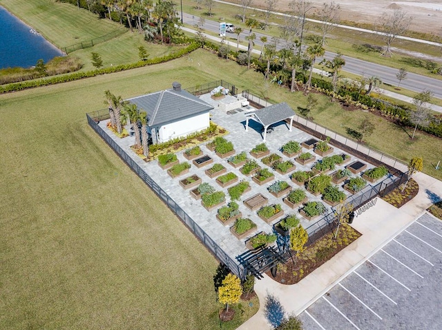 birds eye view of property featuring a water view