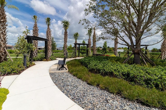 view of property's community with a pergola