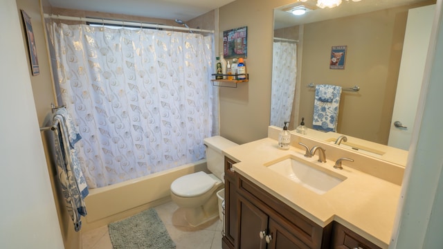 full bathroom featuring shower / tub combo with curtain, tile patterned flooring, vanity, and toilet