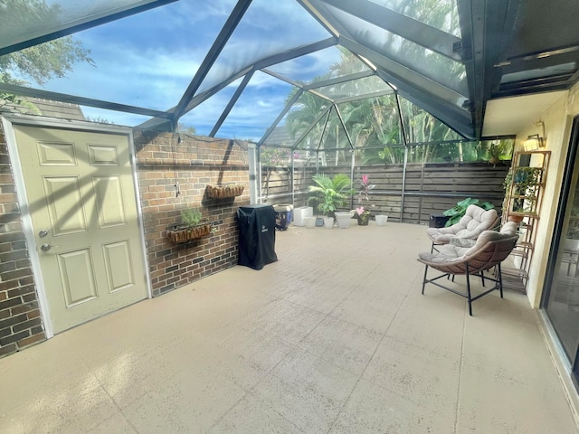 view of patio / terrace with a lanai