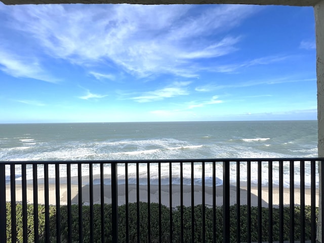 property view of water featuring a beach view