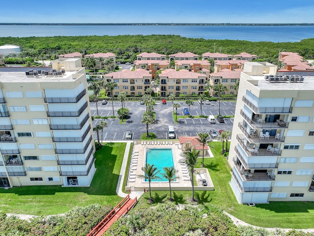 drone / aerial view with a water view