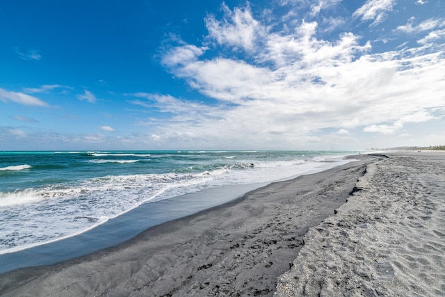 property view of water with a beach view