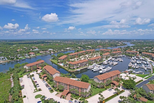 birds eye view of property featuring a water view