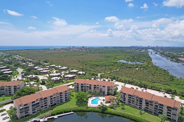 birds eye view of property featuring a water view