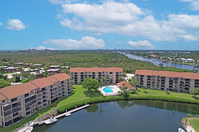 drone / aerial view with a water view