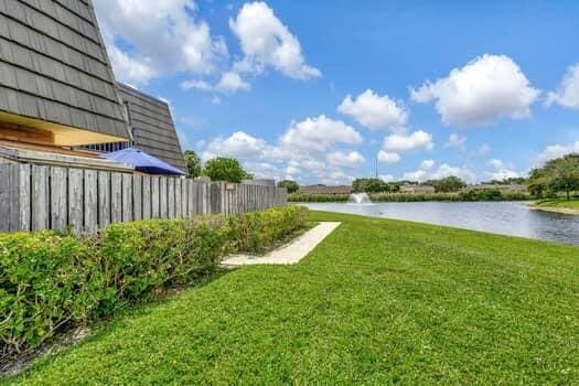 view of yard with a water view