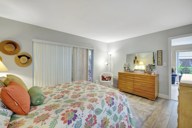 bedroom with light wood-type flooring