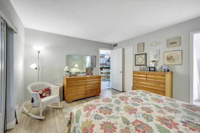 bedroom featuring light hardwood / wood-style flooring