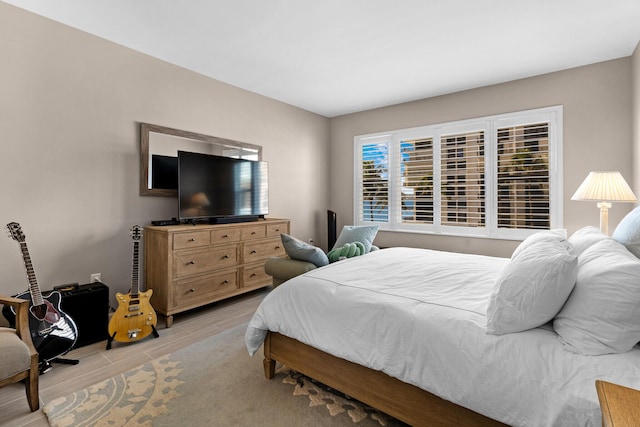 bedroom featuring light wood-type flooring