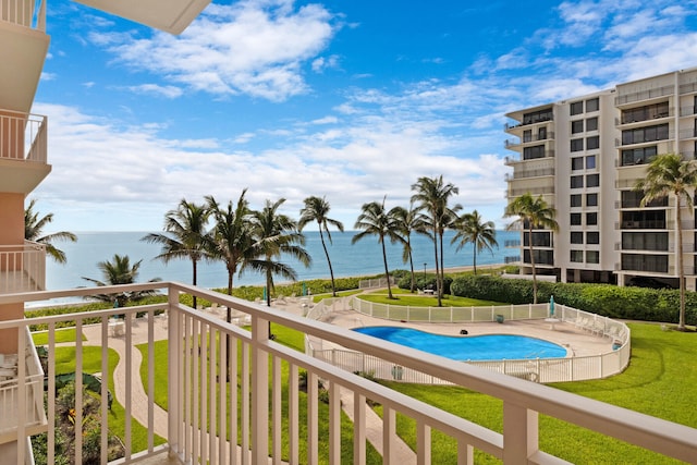 balcony featuring a water view