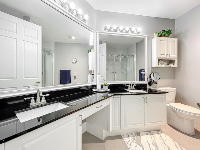 bathroom featuring an enclosed shower, dual bowl vanity, toilet, and tile patterned flooring