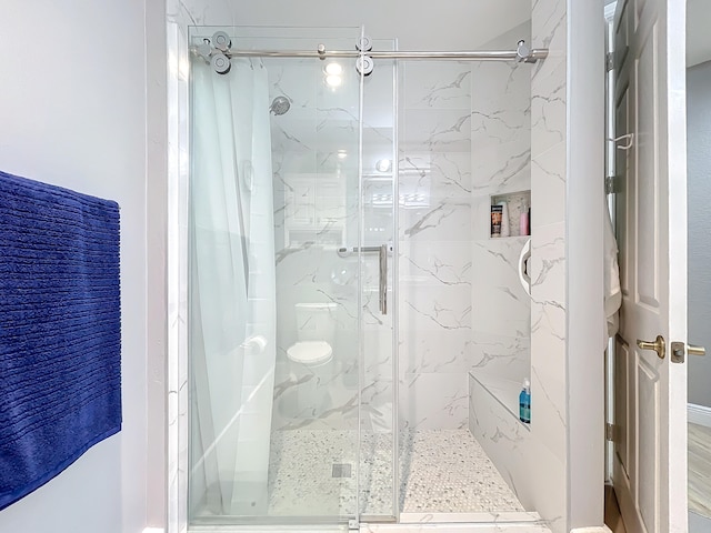 bathroom featuring walk in shower