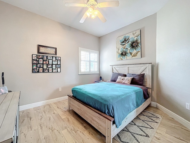 bedroom featuring ceiling fan and light hardwood / wood-style floors