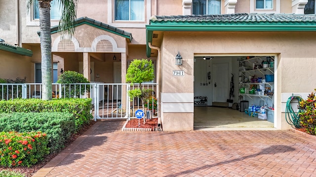 property entrance with a garage