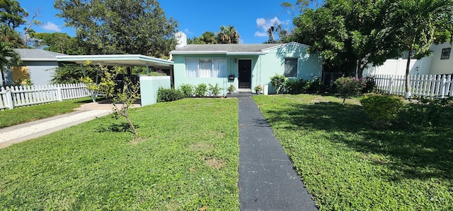 view of front of home with a front yard