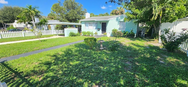 ranch-style house with a front yard