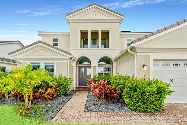 view of front of home with a garage