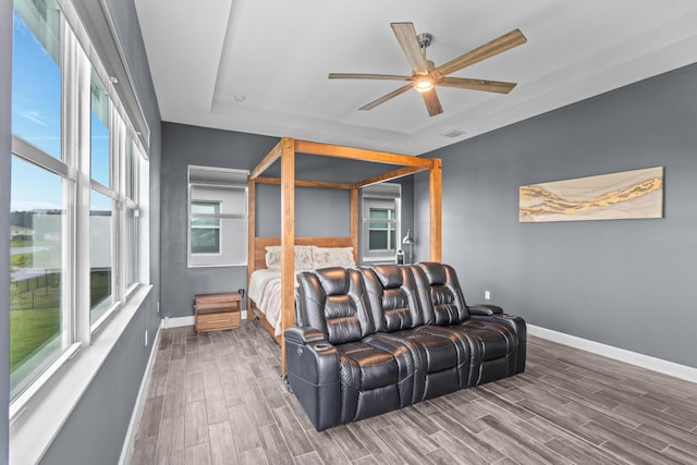 bedroom featuring ceiling fan and hardwood / wood-style flooring