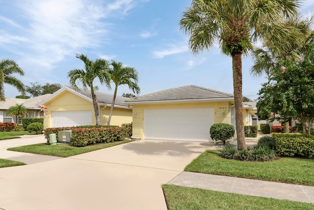 ranch-style home with a garage