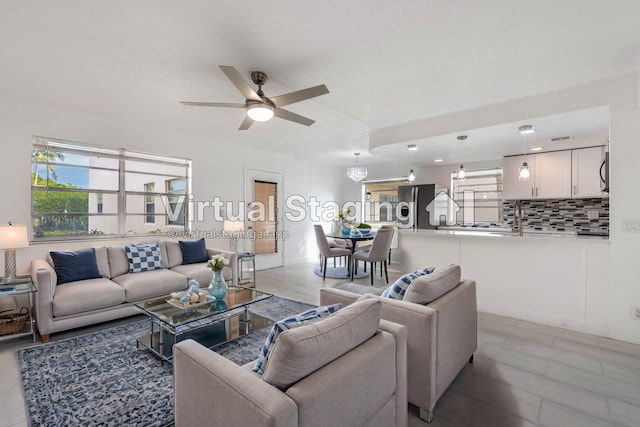 living room featuring ceiling fan