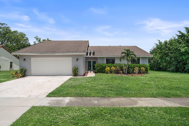 single story home featuring a front yard and a garage