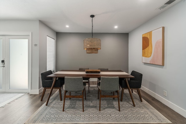 dining room with hardwood / wood-style floors