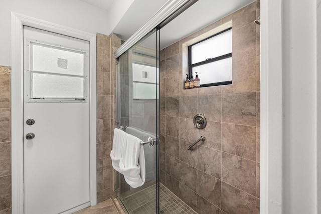 bathroom featuring an enclosed shower