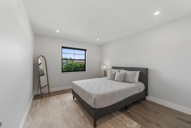 bedroom featuring hardwood / wood-style flooring