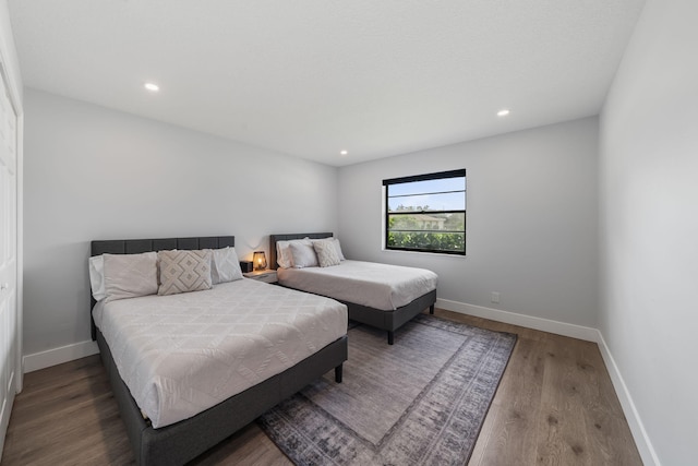 bedroom featuring wood-type flooring