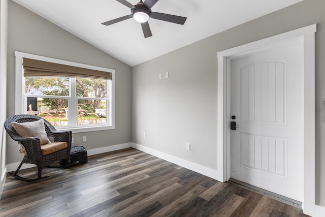 unfurnished room featuring ceiling fan, lofted ceiling, and dark hardwood / wood-style floors