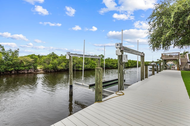 view of dock with a water view