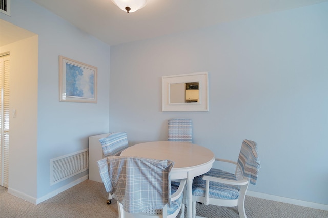 view of carpeted dining room