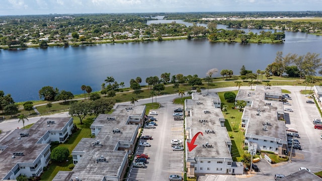 drone / aerial view featuring a water view