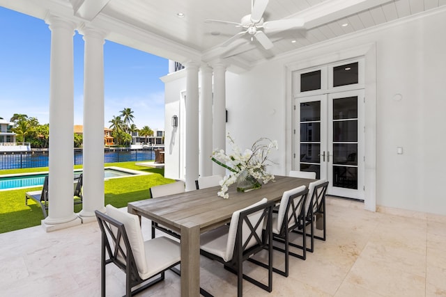 view of patio / terrace featuring ceiling fan and french doors