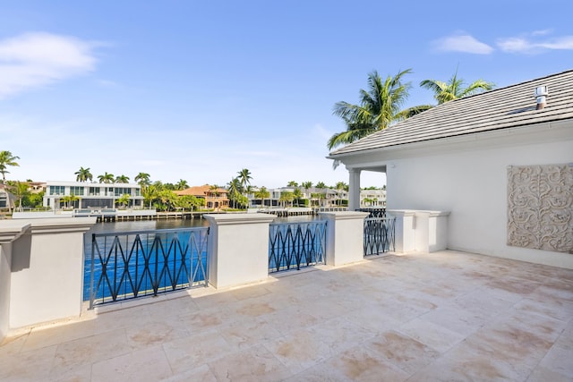 view of patio / terrace featuring a water view