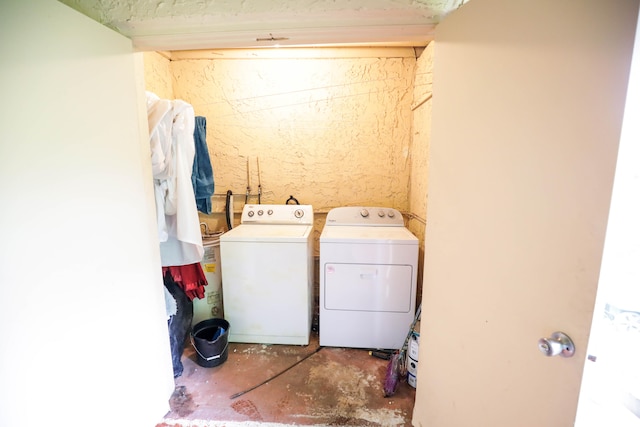 laundry room featuring separate washer and dryer